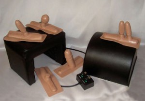 A Sybian (on the right) with accessories and attachments